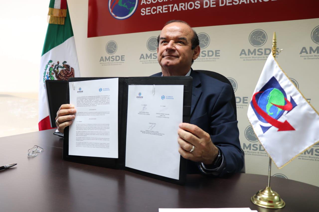 002 FIRMA SECRETARIO DE ECONOMÍA DE COAHUILA CONVENIO DE ENTENDIMIENTO ENTRE LA AMSDE Y US MEXICO FOUNDATION